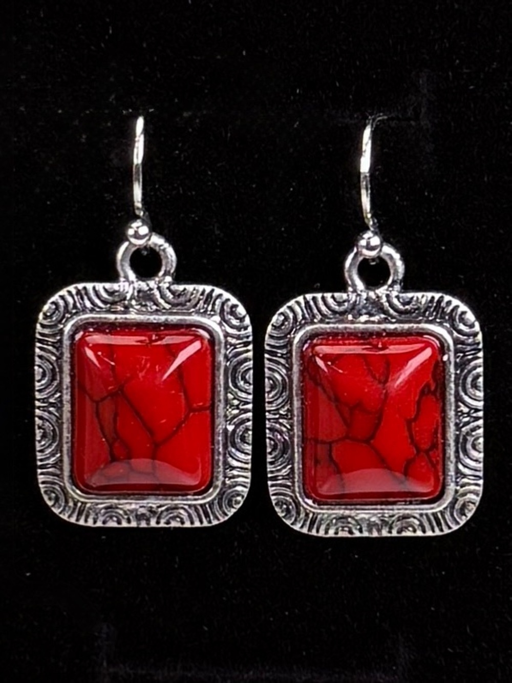Pretty Silvertone with red costume pierced dangle earrings